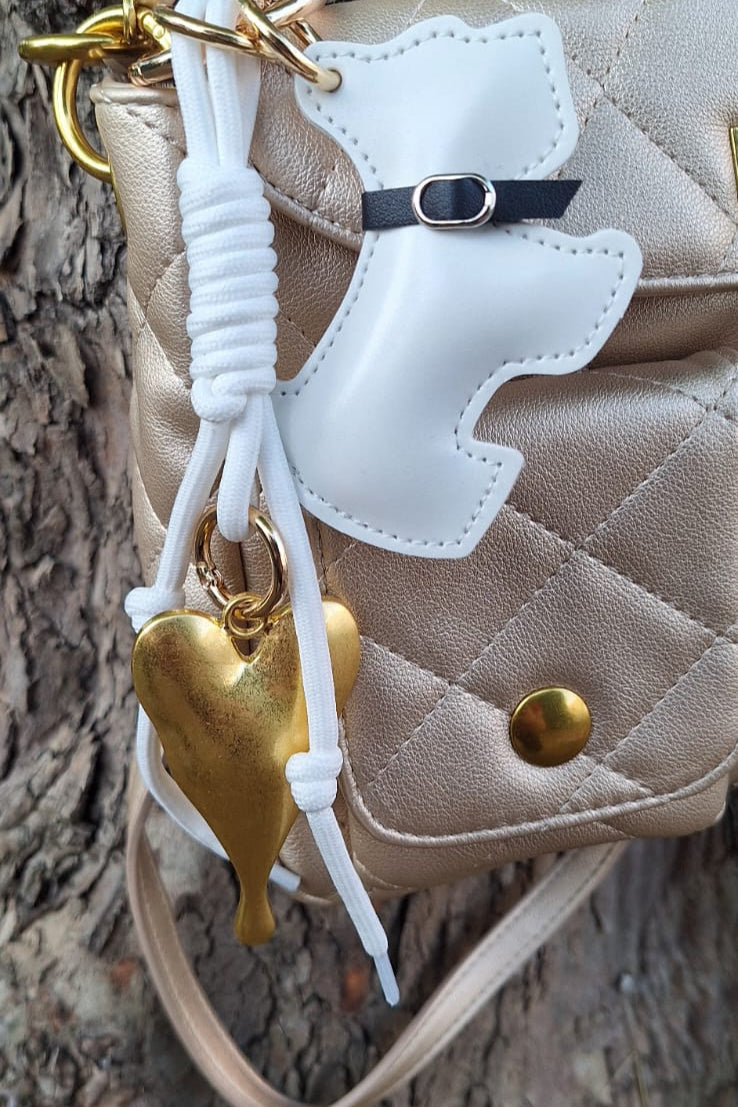 CHARMS CANE ECOPELLE BIANCO CON CUORE METALLO ORO