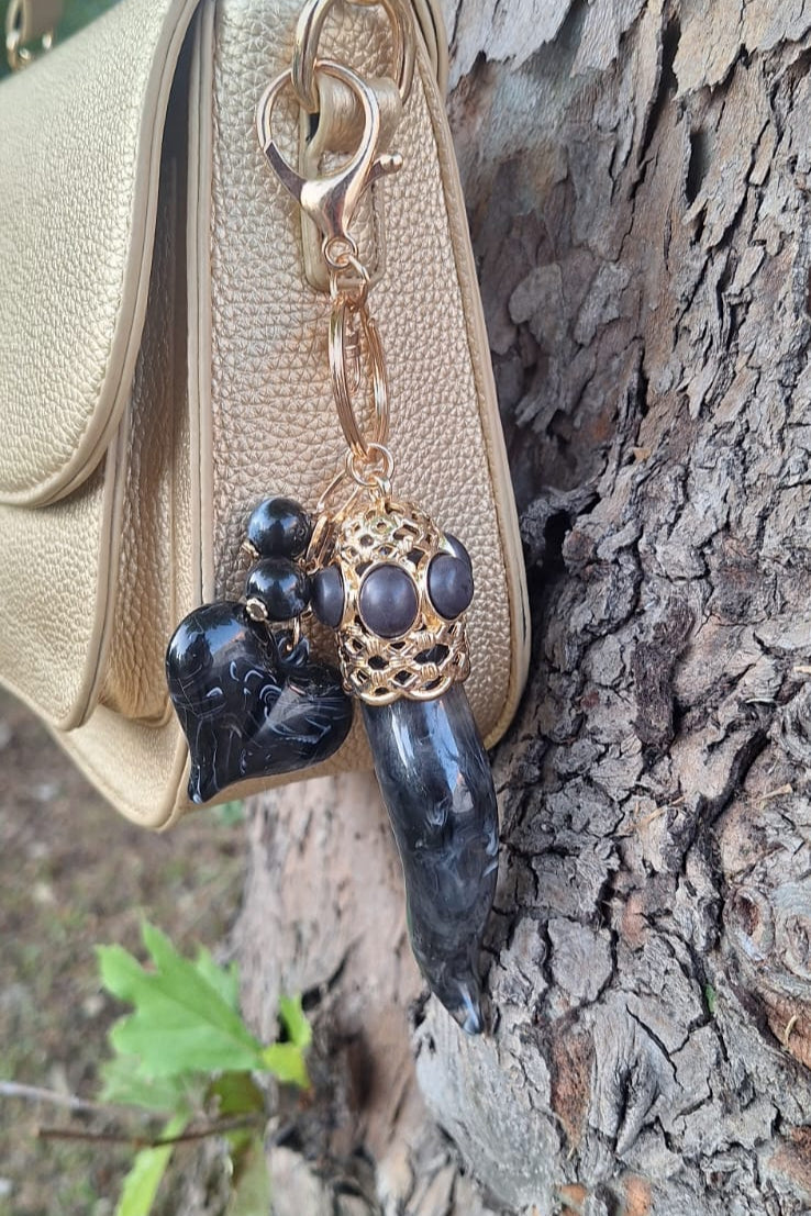 CHARMS CORNO NERO SFUMATO CON CIONDOLO CUORE