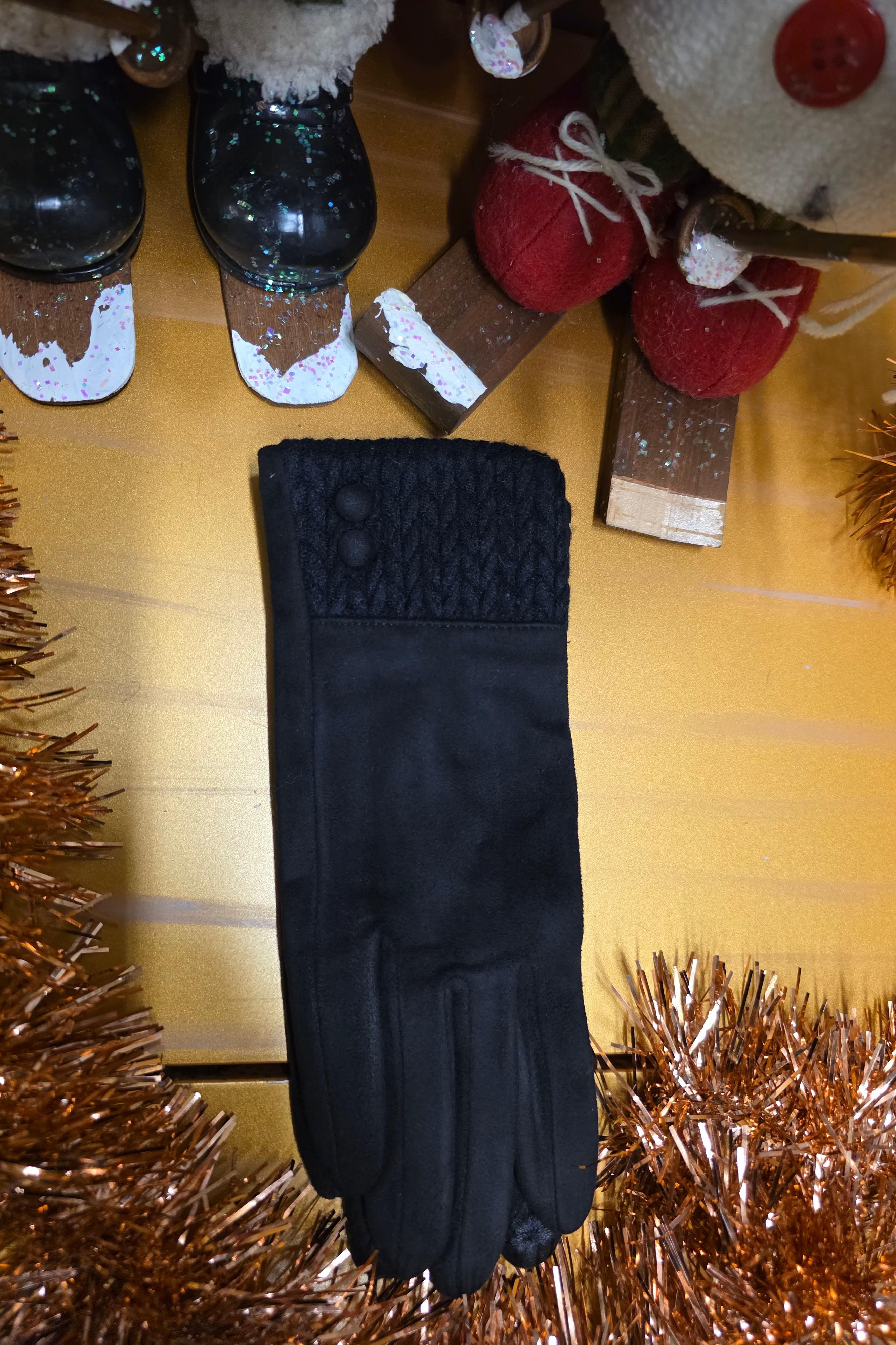 GUANTO NERO BORDO E BOTTONI